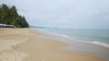 natural sea wave water with foam on the sandy beauty white beach, summer beach seascape