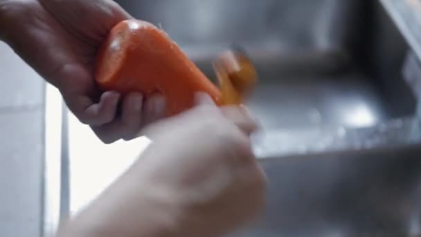 Hand Using Peeler Peel Fresh Carrot Skin Preparing Cooking — Stockvideo