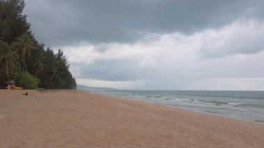 Slowmotion of beach sea sand and sky. Landscape view of beach sea in summer day with peaceful sea in sunshine daytime