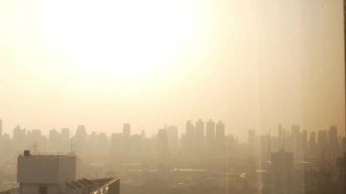 View of skyscraper over the horizontal line while sunrise in big city of bangkok,thailand
