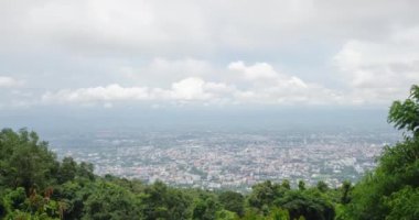 timelapse View of chiang mai town from the sky through the cloudy sky in winter time