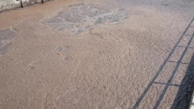 POV to the water surface in treatment pond while in waste water treatment process. Waste water treatment,recycle,environment concept.