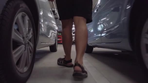 Pov Man Feet While Walking Parking Lot Get Car Slowmotion — Stockvideo