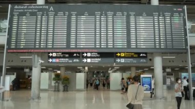 June3,2022:Bangkok,Thailand:flight information in suvarnabhumi airport with many passenger checking their flight