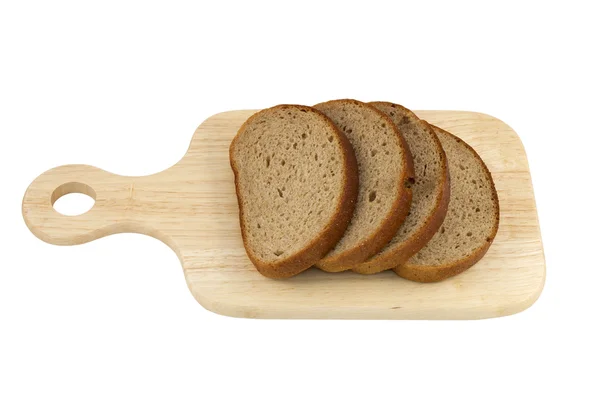 Cutting board with sliced bread — Stock Photo, Image