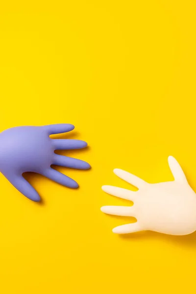 Purple White Inflated Latex Gloves Vibrant Yellow Background Studio Top — Stockfoto