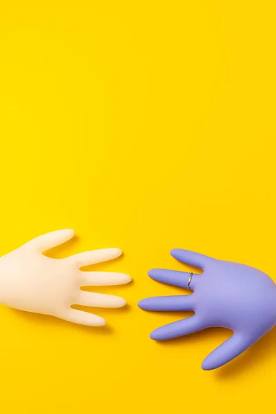 Pair White Purple Inflated Latex Gloves Vibrant Yellow Background Studio — Fotografia de Stock