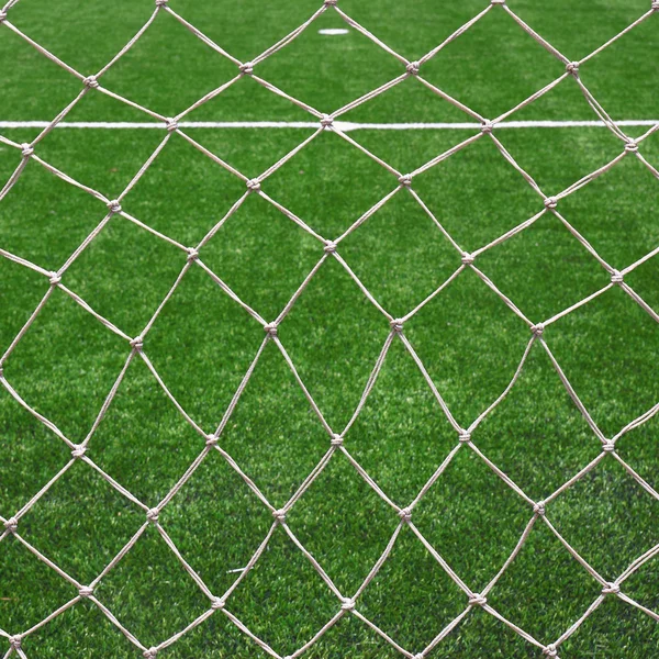 White football net, green grass — Stock Photo, Image