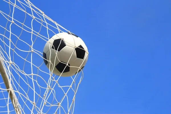 Soccer ball in goal — Stock Photo, Image