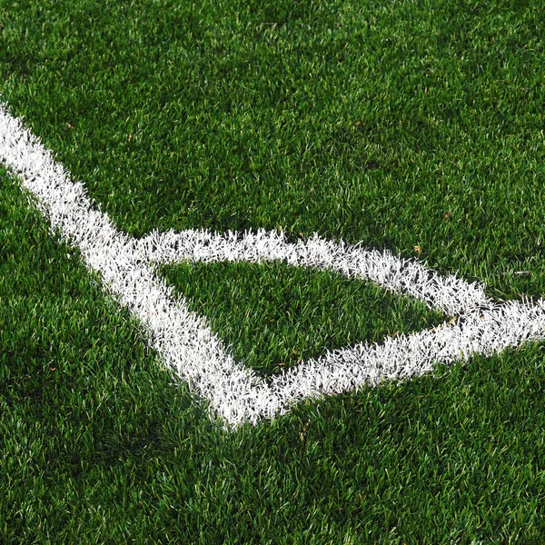 Groen gras textuur in voetbalveld — Stockfoto