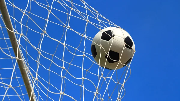 Soccer ball in goal — Stock Photo, Image