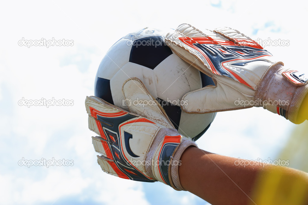 Goalkeeper catches the ball