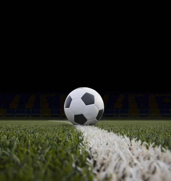 Soccer ball on the green field — Stock Photo, Image