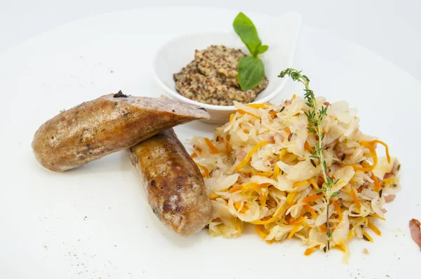 Sausages with sauerkraut — Stock Photo, Image