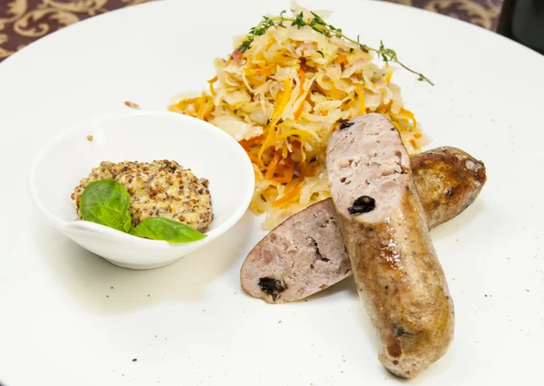 Sausages with sauerkraut — Stock Photo, Image