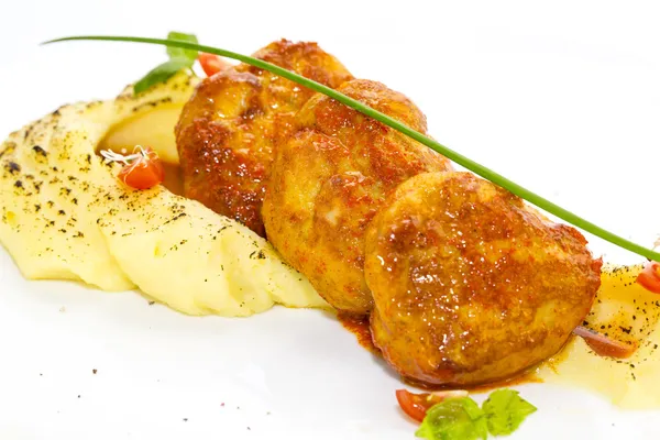 Cutlets fried in carrot sauce — Stock Photo, Image