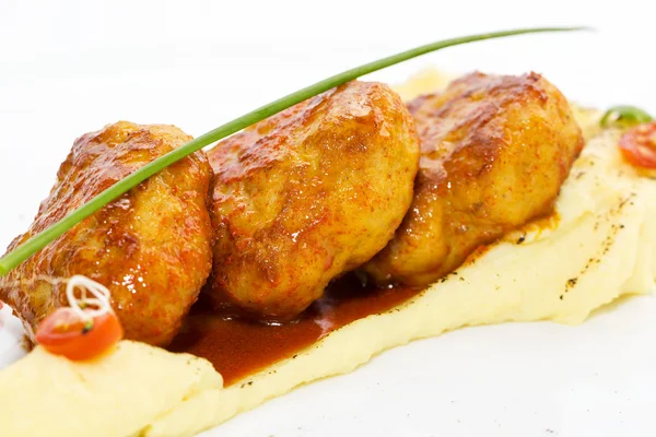 Cutlets fried in carrot sauce — Stock Photo, Image