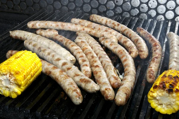 Chicken sausages on the grill — Stock Photo, Image