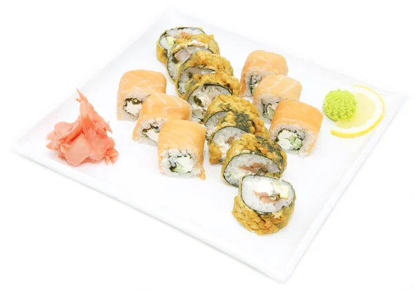 Japanese rolls with fish and vegetables — Stock Photo, Image