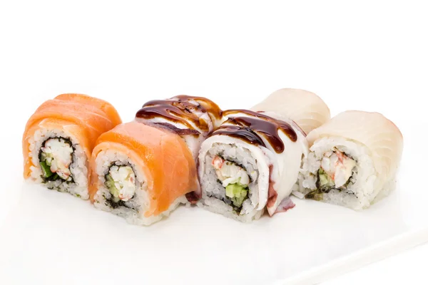 Japanese rolls with fish and vegetables — Stock Photo, Image