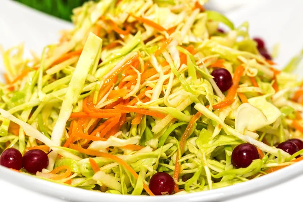 Cabbage salad and vegetables in a restaurant — Stock Photo, Image