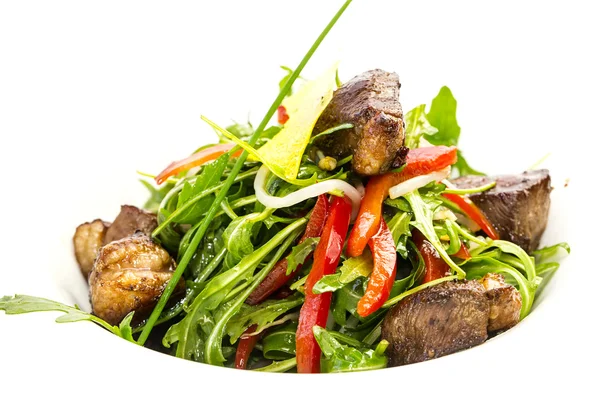 Rabbit liver salad with arugula in a restaurant — Stock Photo, Image