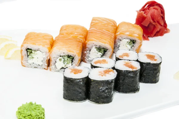 Japanese rolls with fish and vegetables — Stock Photo, Image