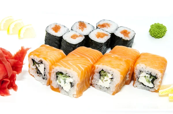 Japanese rolls with fish and vegetables — Stock Photo, Image