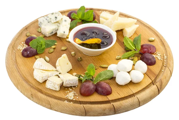 Cheese plate with a large decorated the assortment of mint — Stock Photo, Image