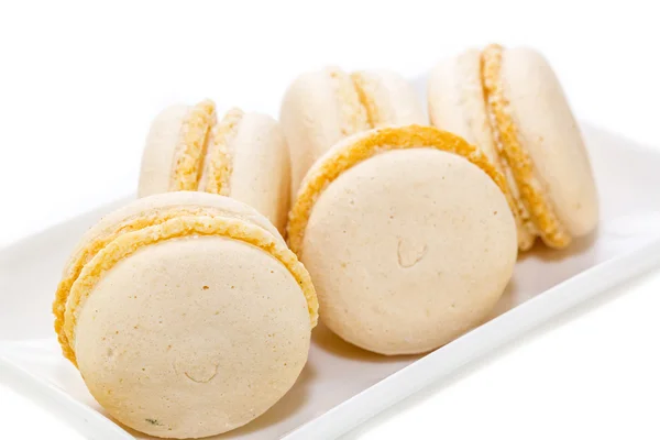 Biscoitos saborosos em um fundo branco — Fotografia de Stock