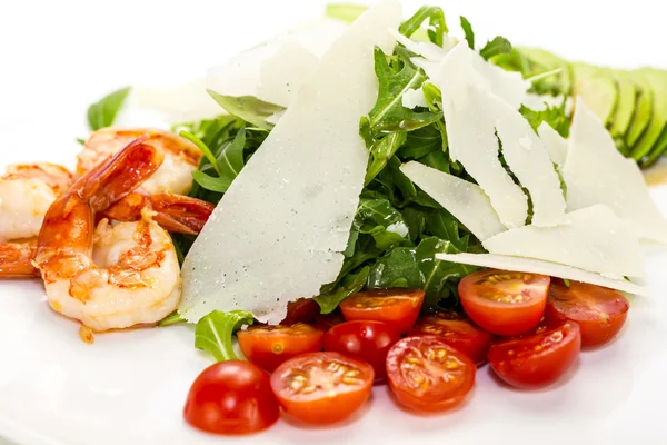 Shrimp salad and greens on a white background — Stock Photo, Image