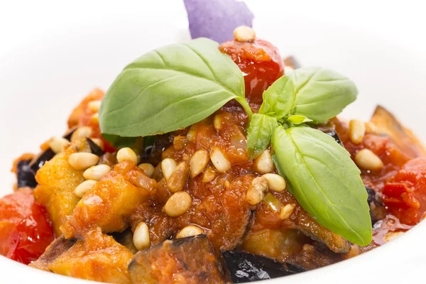 Salad of steamed zucchini on a white dish at restaurant — Stock Photo, Image