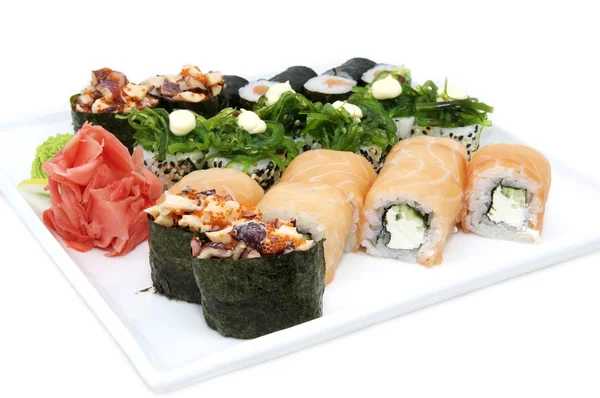 Japanese rolls with fish and vegetables — Stock Photo, Image