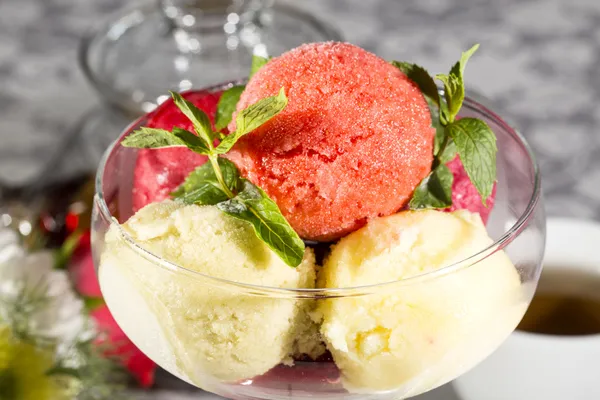 Balls of ice cream decorated with mint — Stock Photo, Image