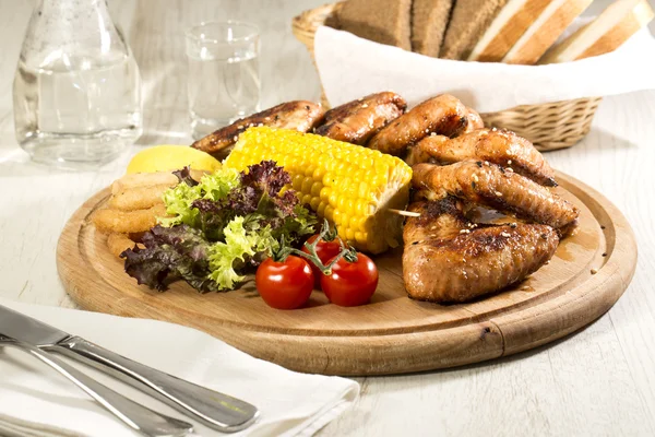 Chicken wings with sweet corn — Stock Photo, Image