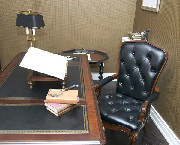 Office with a comfortable chair and table made of wood — Stock Photo, Image