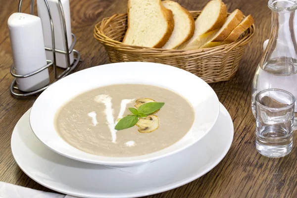Mushroom cream soup on the table in a restaurant — Stock Photo, Image