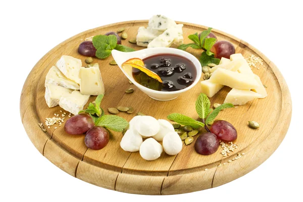 Cheese plate with an assortment of cheese — Stock Photo, Image