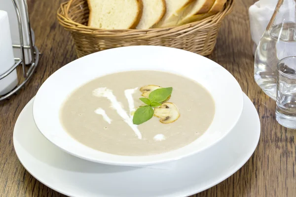Mushroom cream soup on the table in a restaurant — Stock Photo, Image