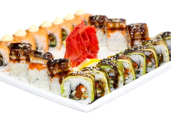 Marisco de sushi japonés en un plato blanco —  Fotos de Stock