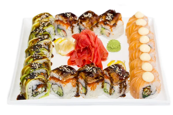 Japansk sushi skaldjur på en vit platta — Stockfoto