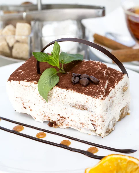 Tiramisu on a table in a restaurant — Stock Photo, Image