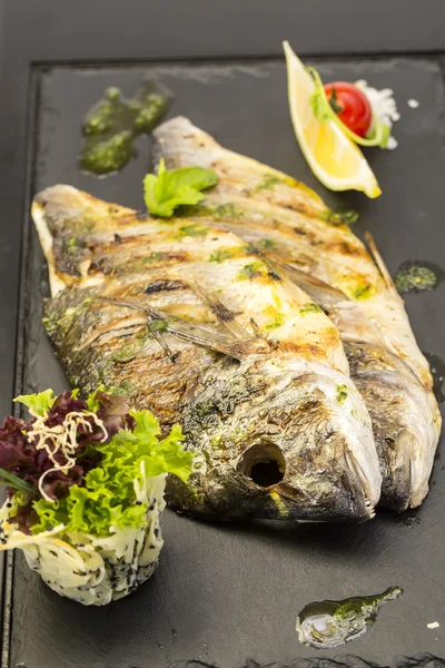 Sea fish cooked on the grill — Stock Photo, Image