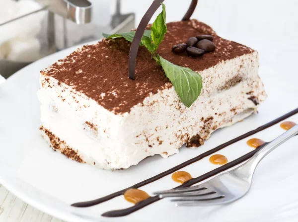 Tiramisu on a table in a restaurant — Stock Photo, Image