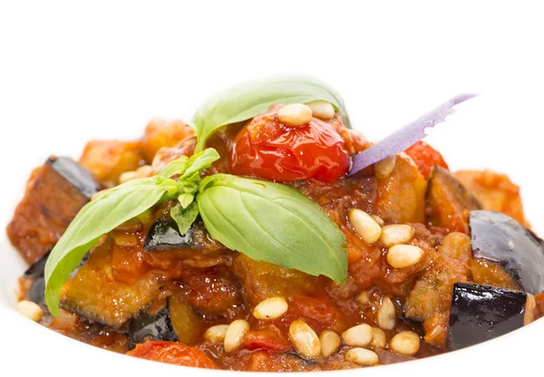 Salad of steamed zucchini on a white dish at restaurant — Stock Photo, Image