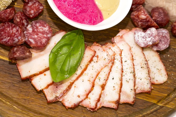 Meat dish with several kinds of sausages — Stock Photo, Image