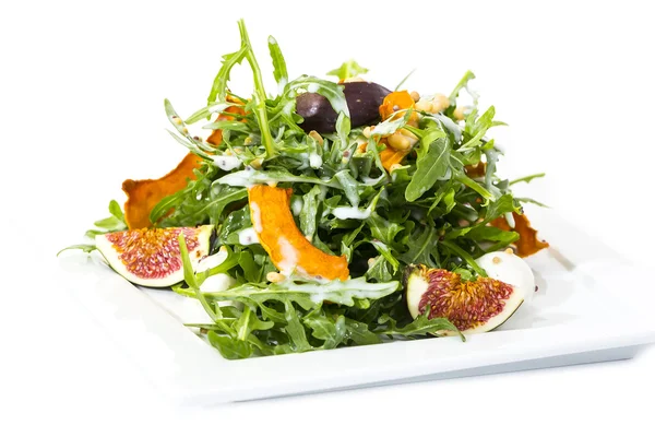 Salad of arugula figs and cheese — Stock Photo, Image