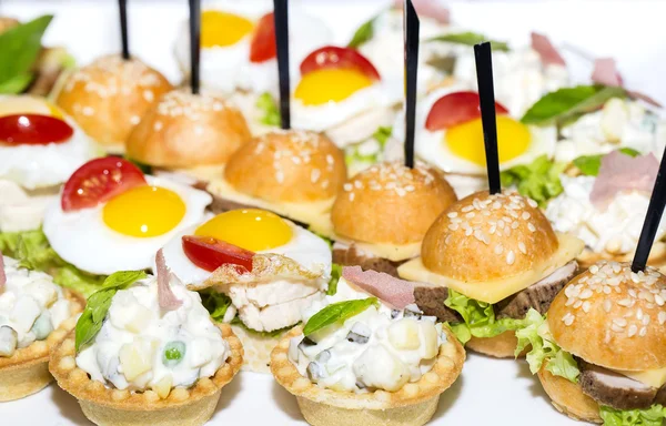 Canape with meat vegetables and eggs — Stock Photo, Image