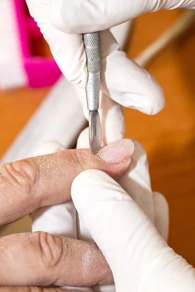 Processes work on a manicure — Stock Photo, Image
