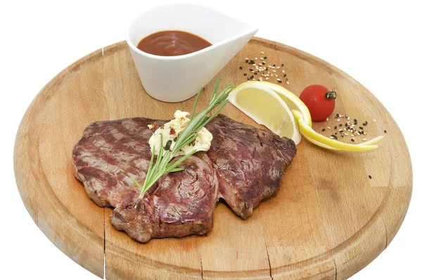 Bife de carne cozinhando na grelha — Fotografia de Stock